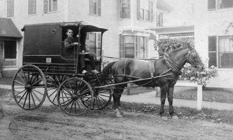 Sumner in delivery wagon